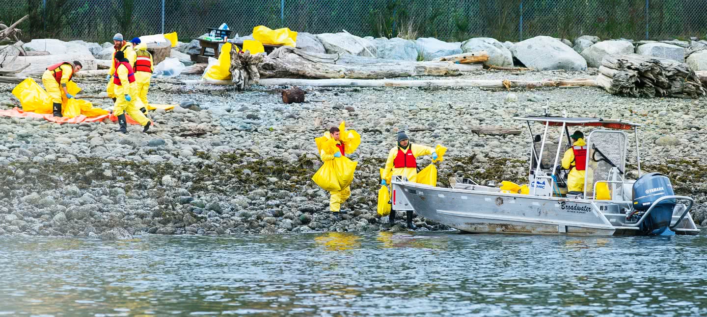 WCMRC cleanup team on beach